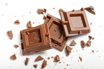 chocolate blocks with pieces, on white background