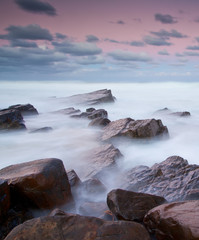 Naklejki  long exposure of misty sea and rocks