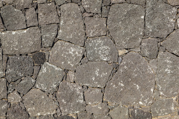 wall made seamless from volcanic stone