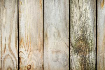 Old fence made ​​of weathered boards