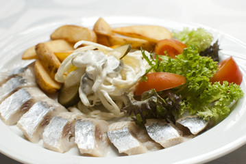 Fish with potatoes and vegetables