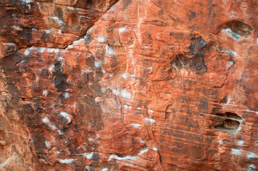 Rock Climbing Routes with Chalk left from Climbers