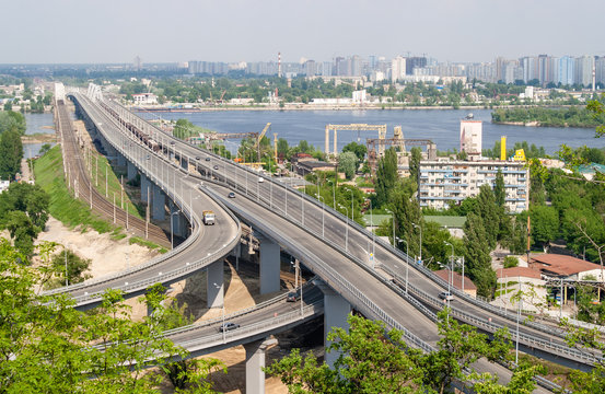 View of highway and railway bridges from a hill over the Dnieper