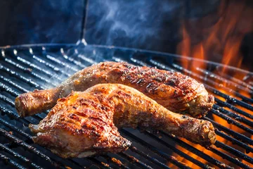 Abwaschbare Fototapete Roast chicken leg on grill © shaiith