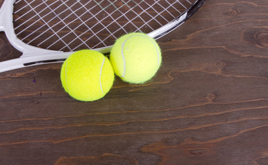 Tennis balls and tennis racket