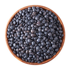 wooden bowl full of beluga lentils isolated on white