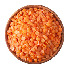 wooden bowl full of red split lentils isolated on white