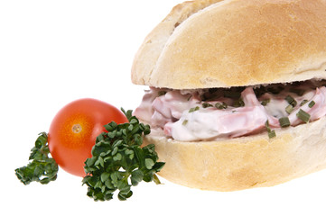 Roll with meat salad isolated on white