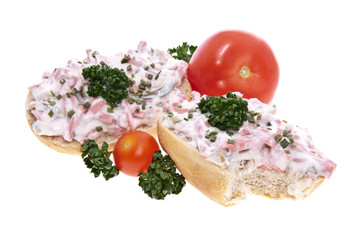 Roll with meat salad isolated on white