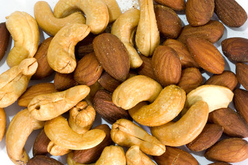 Ripe cashew nuts and almonds