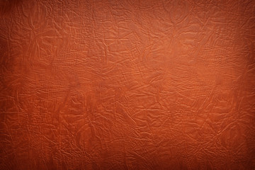 Brown leather texture closeup.