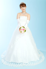 Fototapeta na wymiar Beautiful asian woman dressed as a bride