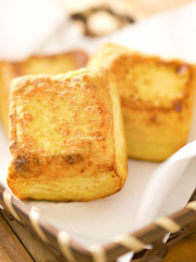 close up of a basket of fried tofu cubes