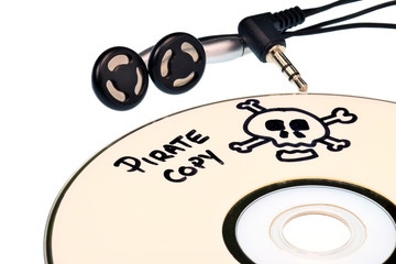 Music piracy with pirate copy cd and headphones