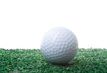 Golf ball on green grass