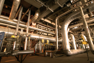 Equipment, cables and piping as found inside of  industrial powe