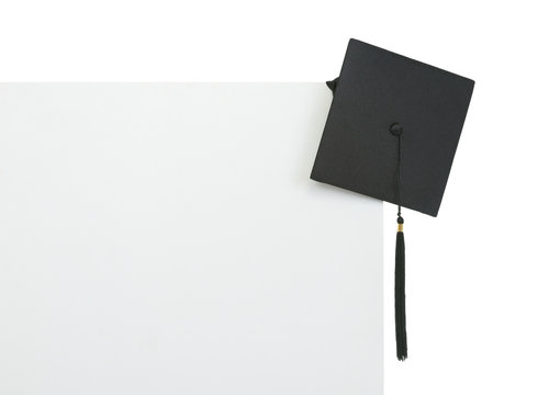 Graduation cap on blank billboard