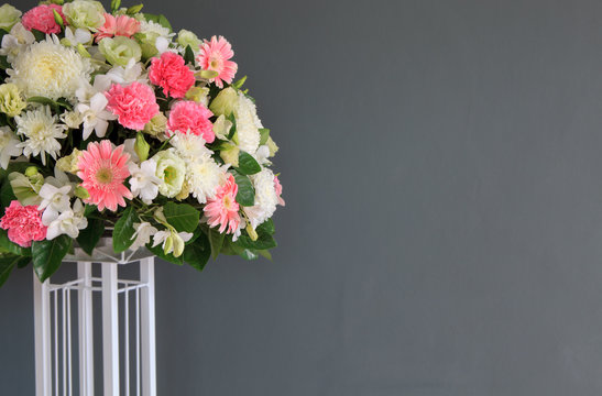 wedding flowers decorated in front of gray color wall background