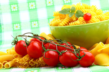 Delicious twig of tomatoes with several pasta types
