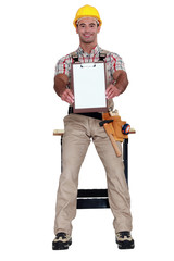 Worker holding clip-board