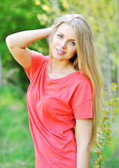 Portrait of happy cheerful smiling young beautiful blond woman,