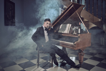 Elegant young man with piano