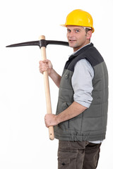 Miner holding pick-ax