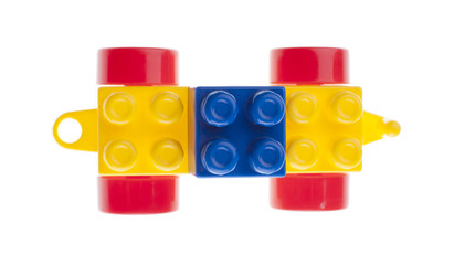 Plastic car with brick