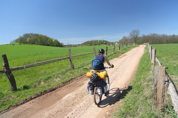 Cyclist in a countryside
