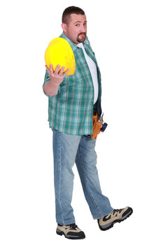 Man showing yellow helmet