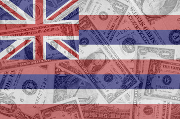 US state of hawaii flag with transparent dollar banknotes in bac