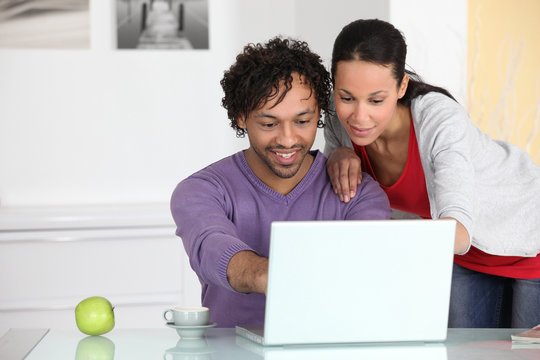 Couple Having Fun On Internet