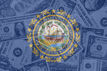 US state of new hampshire flag with transparent dollar banknotes