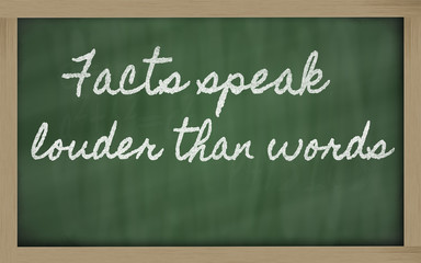 Obraz premium expression - Facts speak louder than words - written on a schoo