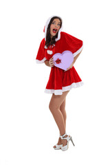 Young woman in a saucy Santa outfit