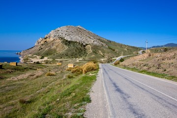 asphalt road in a mountain valley