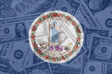 Fototapeta na wymiar US state of virginia flag with transparent dollar banknotes in b