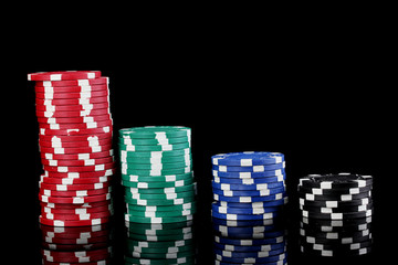 Casino chips isolated on black