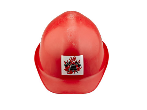 Old red plastic safety  fireman helmet on white background