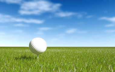 Golf ball green grass and blue sky