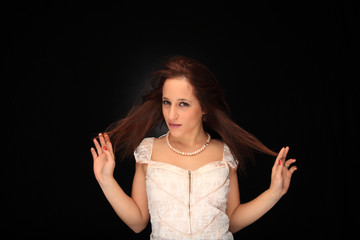 beautiful red hair girl on a black background