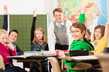 Education - Pupils and teacher learning at school