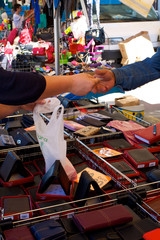 Transaction at the street market color image