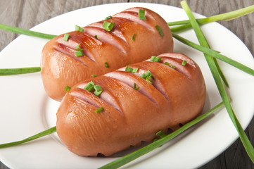 sausages on the grill