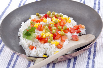rice pan with diced red bell pepper