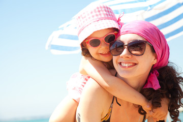 girl and her mother at the seaside