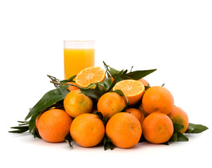 Tangerines and juice glass