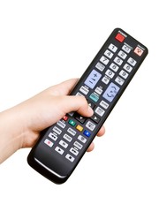 Hand with remote control isolated on white