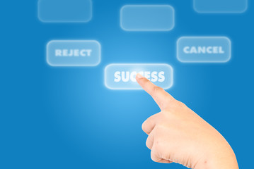 Hand pushing Success word.