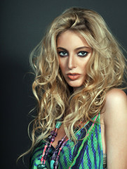 Fototapeta premium Beautiful blonde girl with messy hair pose sexy